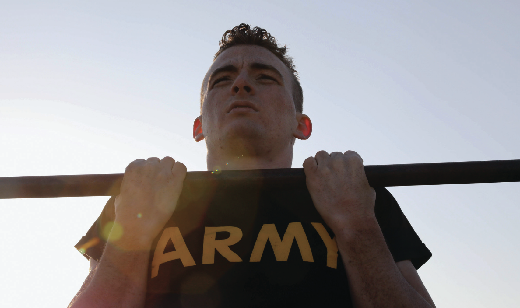 New York National Guard Specialist Stevenson Philip, assigned to 2nd Squadron 101st Cavalry, performs flex arm hang portion of German ArmedForces proficiency badge trial during Best Warrior Competition at Camp Smith, New York, April 4, 2023 (U.S. Army National Guard/Jean Sanon)